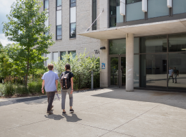 Students walking towards the Student Central office
